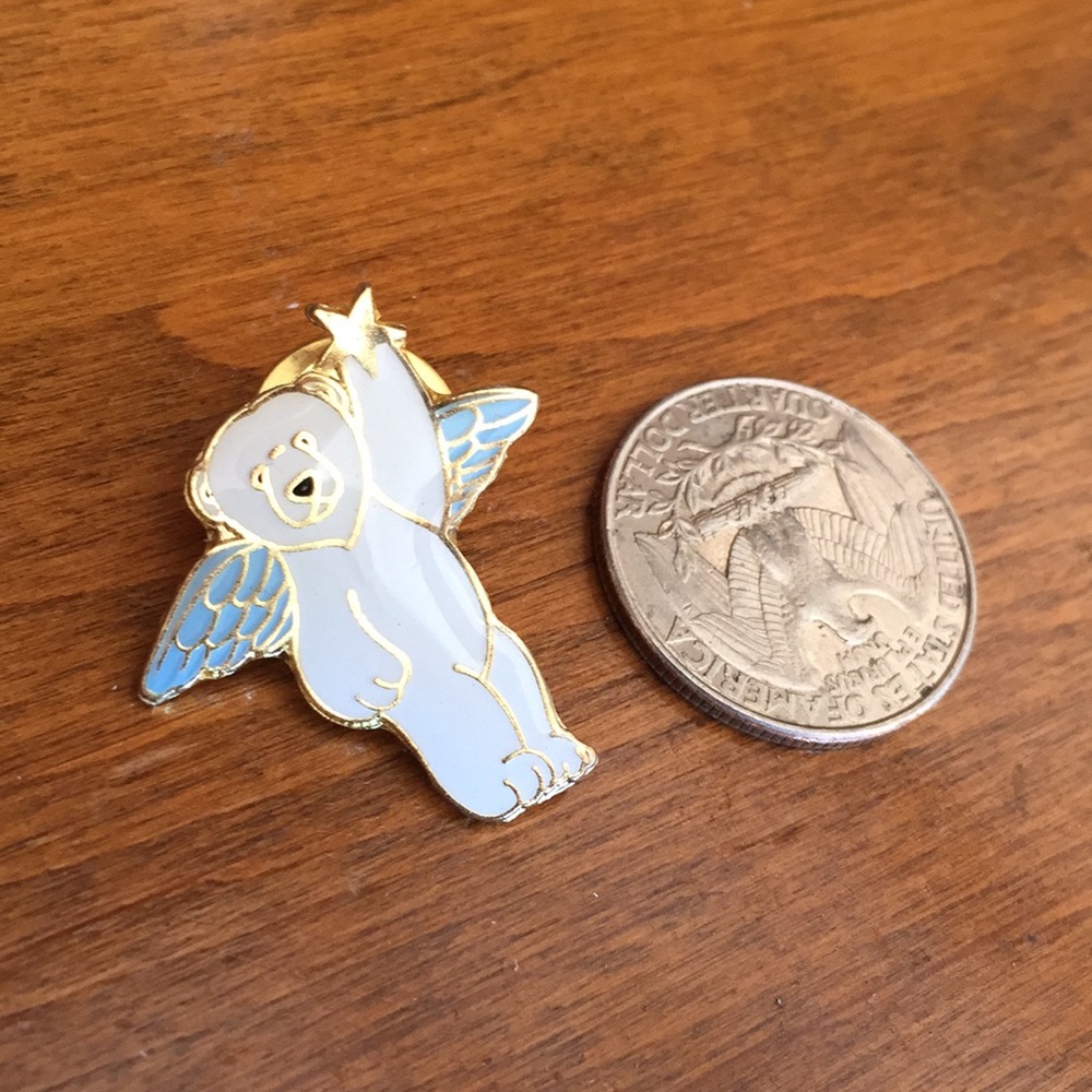 {{SOLD}} Gold enamel Shiro Kuma pin